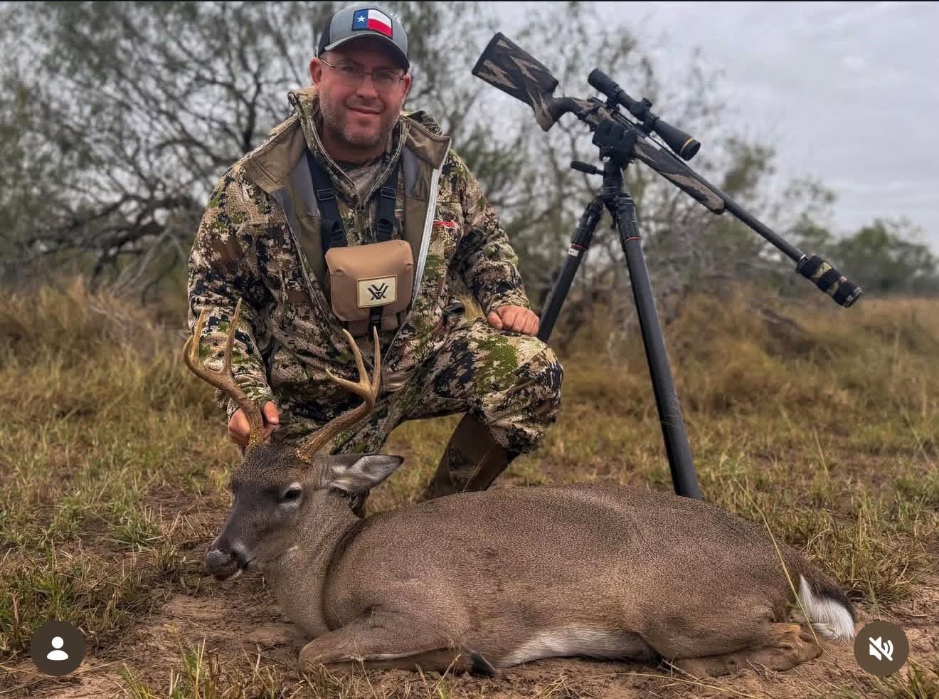 Hunter with harvested whitetail deer